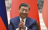 Chinese President Xi Jinping applauds during a signing ceremony at the Great Hall of the People in Beijing, China, May 16, 2024. (Sergei Guneyev, Sputnik, Kremlin Pool Photo via AP)