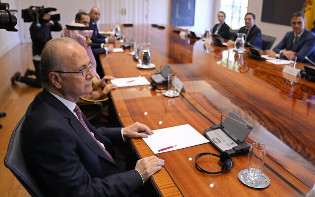 Palestinian Authority Prime Minister Mohammad Mustafa, left, takes part in a meeting with Spain's Foreign Minister Jose Manuel Albares, 2nd right and Spain's Prime Minister Pedro Sanchez, 3rd right with Middle Eastern foreign ministers at the Moncloa Palace in Madrid, Spain, May 29, 2024. (Manu Fernandez/AP) Palestinian Authority Prime Minister Mohammad Mustafa, left, takes part in a meeting with Spain's Foreign Minister Jose Manuel Albares, 2nd right and Spain's Prime Minister Pedro Sanchez, 3rd right with Middle Eastern foreign ministers at the Moncloa Palace in Madrid, Spain, May 29, 2024. (Manu Fernandez/AP)