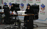Iranian elections headquarters staff work to register candidates for the June 28 presidential elections at the Interior Ministry in Tehran, Iran, Thursday, May 30, 2024. (AP Photo/Vahid Salemi)