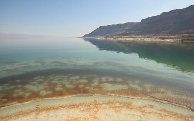 Salt formations and sinkholes at the Dead Sea, southern Israel, May 2, 2023. (Mendy Hechtman/Flash90) Salt formations and sinkholes at the Dead Sea, southern Israel, May 2, 2023. (Mendy Hechtman/Flash90)