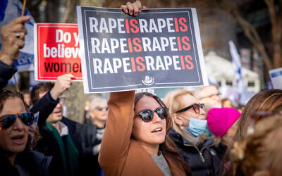 Demonstrators gather during a protest decrying sexual violence against women in the October 7 massacre, outside of United Nations headquarters in New York City, on December 4, 2023. (Yakov Binyamin/Flash90)
