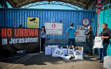 Israelis protest against UNRWA outside its offices in Jerusalem, March 13, 2024. (Arie Leib Abrams/Flash90)