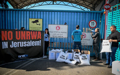Israelis protest against UNRWA outside its offices in Jerusalem, March 13, 2024. (Arie Leib Abrams/Flash90) Israelis protest against UNRWA outside its offices in Jerusalem, March 13, 2024. (Arie Leib Abrams/Flash90)
