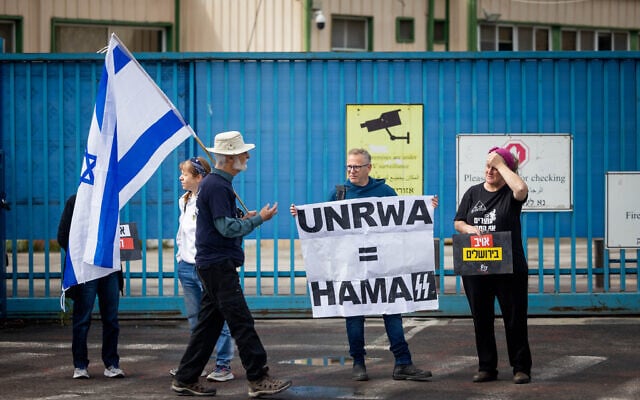 Activists protest against the United Nations Relief and Works Agency for Palestine Refugees (UNRWA), outside its offices in Jerusalem, March 27, 2024. (Yonatan Sindel/ Flash90) Activists protest against the United Nations Relief and Works Agency for Palestine Refugees (UNRWA), outside its offices in Jerusalem, March 27, 2024. (Yonatan Sindel/ Flash90)