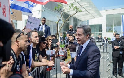 US Secretary of State Antony Blinken (R) meets with the families of the hostages held by Hamas, outside of a hotel, in Tel Aviv, on May 1, 2024. (Avshalom Sassoni/Flash90)