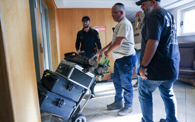 Police raid the Al Jazeera offices in East Jerusalem on May 5, 2024. (Chaim Goldberg/Flash90)