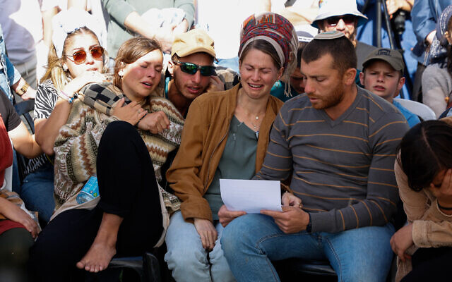 Family and friends of Elyakim Libman, who was believed to have been taken hostage on October 7 but his body later discovered in Israel, attend his funeral outside the Tomb of the Patriarchs, in the West Bank city of Hebron, May 5, 2024. (Gershon Elinson/Flash90)