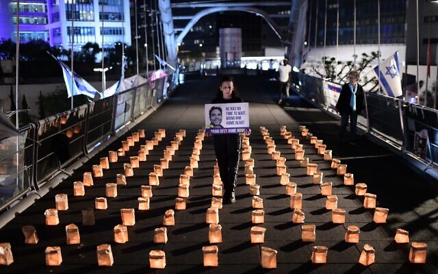 Demonstrators protest for the release of hostages held in the Gaza Strip outside the Kirya military headquarters in Tel Aviv, on the eve of Holocaust Remembrance Day, May 5, 2024. (Tomer Neuberg/Flash90)