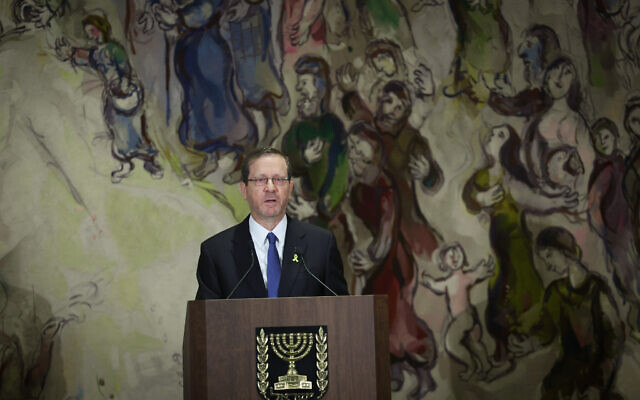 President Isaac Herzog attends a Holocaust Remembrance Day ceremony held at the Knesset in Jerusalem, May 5, 2024 (Yonatan Sindel/Flash90 ) President Isaac Herzog attends a Holocaust Remembrance Day ceremony held at the Knesset in Jerusalem, May 5, 2024 (Yonatan Sindel/Flash90 )