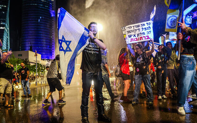 Demonstrators clash with police during a protest calling for the release of hostages held by terror groups in the Gaza Strip since October 7 and against the government near the IDF's Hakirya Base in Tel Aviv, May 11, 2024. (Itai Ron/Flash90) Demonstrators clash with police during a protest calling for the release of hostages held by terror groups in the Gaza Strip since October 7 and against the government near the IDF's Hakirya Base in Tel Aviv, May 11, 2024. (Itai Ron/Flash90)
