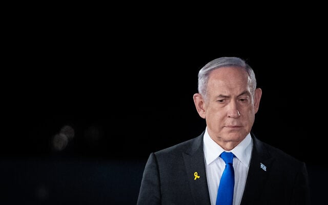 Prime Minister Benjamin Netanyahu attends a Memorial Day ceremony for Israel's fallen soldiers and victims of terror, at the Knesset in Jerusalem, May 12, 2024. (Yonatan Sindel/Flash90) Prime Minister Benjamin Netanyahu attends a Memorial Day ceremony for Israel's fallen soldiers and victims of terror, at the Knesset in Jerusalem, May 12, 2024. (Yonatan Sindel/Flash90)