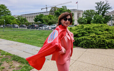 Rep. Kathy Manning (D-NC) poses for a photo in her cape given to her by MomsRising at the Mother's Day Press Conference calling for action on Care and Reproductive rights on May 8, 2024 in Washington. (Photo by Jemal Countess/Getty Images for MomsRising, via JTA)