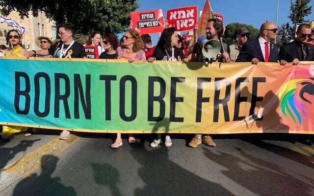 Marchers in Jerusalem Pride Parade begin procession from Liberty Bell Park on May 30, 2024. (Charlie Summers/Times of Israel)