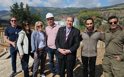 Illustrative: Jewish National Fund USA leaders stand in front of the soon to be completed Kiryat Shmona Medical Center, spring 2024. (Courtesy)