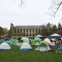 A tent encampment is seen at Northwestern University on Friday, April 26, 2024, in Evanston, Illinois. Students want the university to divest from funds connected to Israel or that profit from its war in Gaza. (AP Photo/Teresa Crawford)