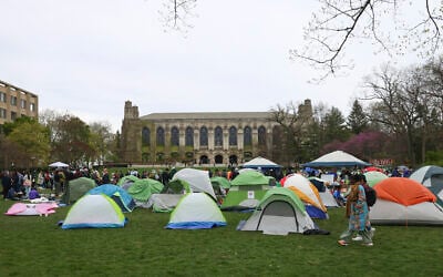 A tent encampment is seen at Northwestern University on Friday, April 26, 2024, in Evanston, Illinois. Students want the university to divest from funds connected to Israel or that profit from its war in Gaza. (AP Photo/Teresa Crawford)