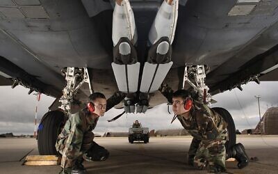 Illustrative: US airmen perform a final check of the stowed twin wings on four ground-training Guided Bomb Unit-39 small-diameter bombs loaded on an F-15E Strike Eagle at Royal Air Force Lakenheath, England, on Aug. 1, 2006 (US Air Force photo/Master Sgt. Lance Cheung) .