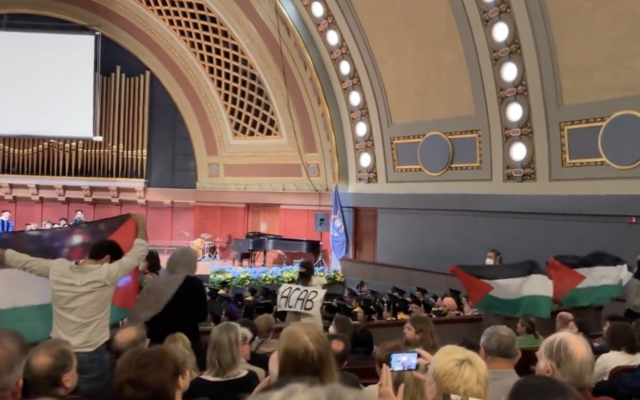 Pro-Palestinian protesters interrupt a commencement ceremony at the University of Michigan, May 3, 2024. (Screenshot, used in accordance with Clause 27a of the Copyright Law) Pro-Palestinian protesters interrupt a commencement ceremony at the University of Michigan, May 3, 2024. (Screenshot, used in accordance with Clause 27a of the Copyright Law)