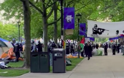 Police officers in riot gear move in to dismantle an anti-Israel protest encampment at Chicago's DePaul University, May 16, 2024. (Screenshot, used in accordance with Clause 27a of the Copyright Law)