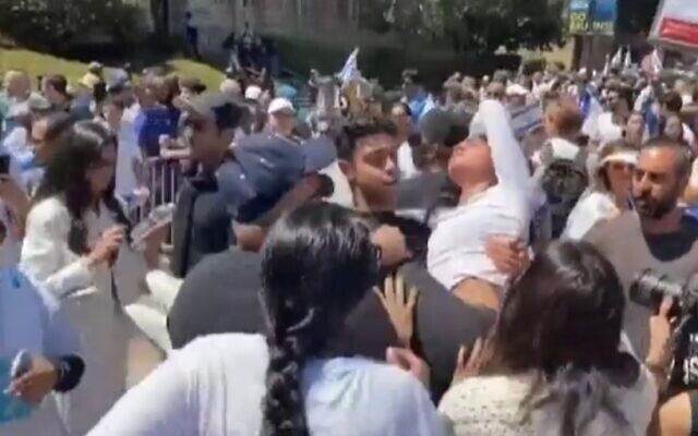 Pro-Israel protester Elinor Hess is carried after being injured during a rally in Loas Angeles, April 30, 2024 (Channel 12 video screenshot; used in accordance with Clause 27a of the Copyright Law)
