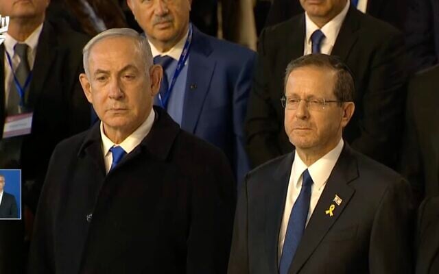 Prime Minister Benjamin Netanyahu (Left) and President Isaac Herzog arrive at the Holocaust Remembrance Day Ceremony at Yad Vashem, in Jerusalem, May 5, 2024. (Screenshot, Yad Vashem)