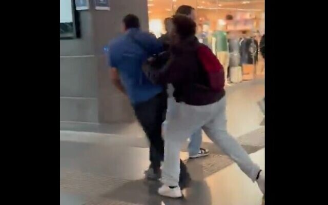 A suspect attacks a Jewish man at a train station in Bruges, Belgium on May 17, 2024. (Screen capture/X) A suspect attacks a Jewish man at a train station in Bruges, Belgium on May 17, 2024. (Screen capture/X)