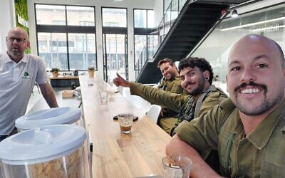 NatureGrowth COO Ben Friedman, pictured with IDF soldiers using NatureGrowth's SafeSpace in December 2023 (Ben Friedman)
