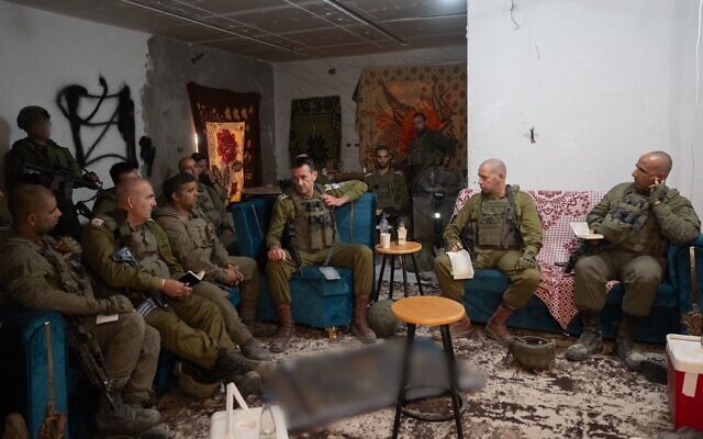IDF Chief of Staff Lt. Gen. Herzi Halevi (center) meets with officers in southern Gaza's Rafah, May 29, 2024. (Israel Defense Forces) IDF Chief of Staff Lt. Gen. Herzi Halevi (center) meets with officers in southern Gaza's Rafah, May 29, 2024. (Israel Defense Forces)