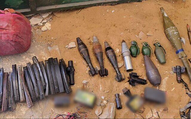 An arms cache uncovered by troops in Gaza, in a handout photo published by the Israeli military on May 30, 2024. (Israel Defense Forces)