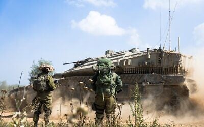 Troops of the 460th Armored Brigade operate in northern Gaza's Jabaliya, in a handout photo published May 13, 2024. (Israel Defense Forces)