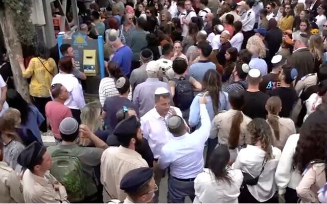 Hundreds of strangers attend the funeral of Holocaust survivor Esther Greizer in Haifa on May 6, 2024 (Screen grab via Channel 12 news) Hundreds of strangers attend the funeral of Holocaust survivor Esther Greizer in Haifa on May 6, 2024 (Screen grab via Channel 12 news)