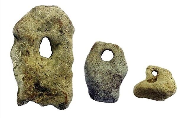 Stone sinkers likely used to weigh down fishing nets, found at the 'Habonim North' martime archaeological site, off the coast of northern Israel. (courtesy Cambridge University Press/CC BY) Stone sinkers likely used to weigh down fishing nets, found at the 'Habonim North' martime archaeological site, off the coast of northern Israel. (courtesy Cambridge University Press/CC BY)