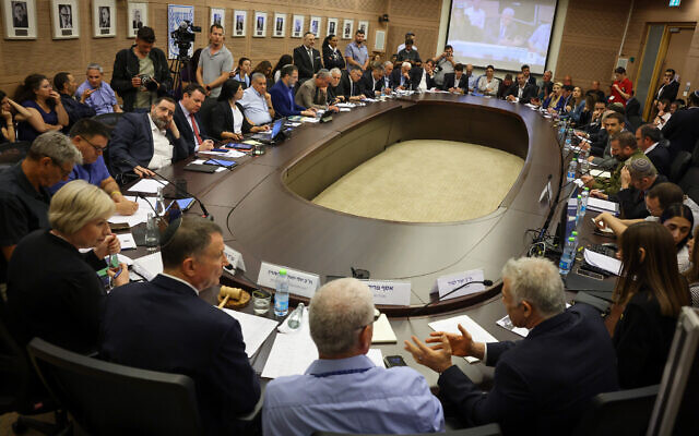Lawmakers take part in a debate on ultra-Orthodox enlistment in the Knesset Foreign Affairs and Defense Committee on June 18, 2024. (Noam Moskowitz/Knesset spokesman) Lawmakers take part in a debate on ultra-Orthodox enlistment in the Knesset Foreign Affairs and Defense Committee on June 18, 2024. (Noam Moskowitz/Knesset spokesman)