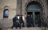 People enter the District Court in Stockholm, Sweden, on September 5, 2023. (Jonathan NACKSTRAND/AFP)