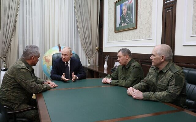 Russia's President Vladimir Putin (C) meeting with Russian defense minister Sergei Shoigu (L) and Russian Army chief of staff Valery Gerasimov (2nd R), as he visits the military headquarters in Rostov-on-Don, November 9, 2023. (Gavriil GRIGOROV / POOL / AFP) Russia's President Vladimir Putin (C) meeting with Russian defense minister Sergei Shoigu (L) and Russian Army chief of staff Valery Gerasimov (2nd R), as he visits the military headquarters in Rostov-on-Don, November 9, 2023. (Gavriil GRIGOROV / POOL / AFP)