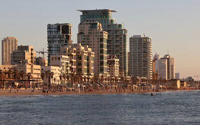 A view of the skyline of Israel's coastal city of Tel Aviv during the sunset, March 5, 2024. (Jack Guez / AFP)