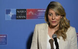 Canadian Foreign Minister Melanie Joly talks to media as she arrives to attend an informal meeting of NATO Ministers of Foreign Affairs at Czernin Palace in Prague, Czech Republic on May 31, 2024. (Michal Cizek / AFP)