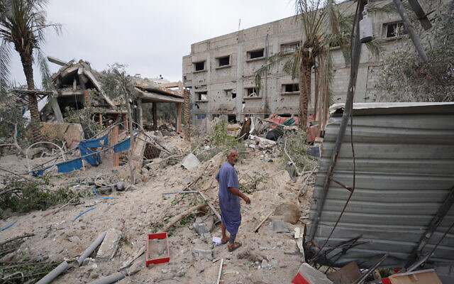 A Palestinian man inspects the damage to a house after an Israeli strike in Nuseirat, in the central Gaza Strip, on June 3, 2024 (Photo by Bashar TALEB / AFP) A Palestinian man inspects the damage to a house after an Israeli strike in Nuseirat, in the central Gaza Strip, on June 3, 2024 (Photo by Bashar TALEB / AFP)