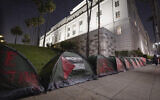 Tents are pictured at a pro-Palestinian encampment set up outside City Hall in downtown Los Angeles on June 3, 2024. (Etienne Laurent/AFP)