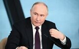Russia's President Vladimir Putin speaks with heads of International news agencies in Saint Petersburg on June 5, 2024. -  (Vladimir ASTAPKOVICH / POOL / AFP)