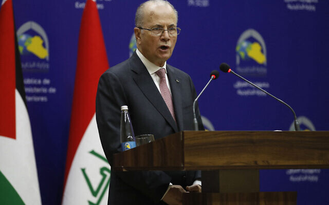 Palestinian Authority Prime Minister Muhammad Mustafa addresses the media during a joint press conference with the Iraqi foreign minister, in Baghdad, on June 6, 2024. (Ahmad Al-Rubaye/AFP)