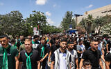 Students of Birzeit University in the West Bank chant slogans during a protest in support of Gaza on June 10, 2024. (Zain Jaafar / AFP)