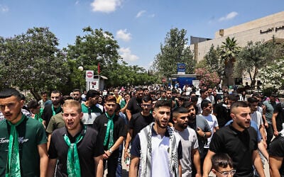 Students of Birzeit University in the West Bank chant slogans during a protest in support of Gaza on June 10, 2024. (Zain Jaafar / AFP)