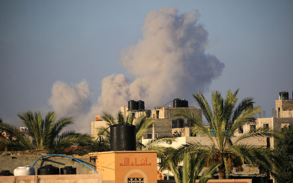 This picture taken from the central Gaza Strip town of al-Zawaida shows smoke billowing following an Israeli strike south of Gaza City, on June 11, 2024. (Eyad BABA / AFP)