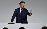 France's President Emmanuel Macron delivers remarks during a press conference held at the Pavillon Cambon Capucines in Paris, June 12, 2024. (Stephane de Sakutin / AFP)
