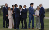 World leaders talk during a flag ceremony with paratroopers at Borgo Egnazia Golf Club San Domenico as part of the G7 Summit hosted by Italy in Apulia region, on June 13, 2024 in Savelletri. (Ludovic Marin/AFP)