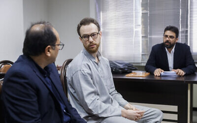 Swedish EU diplomat Johan Floderus (C) attends a court session in Tehran on December 10, 2023. (Amir Abbas Ghasemi / Mizan News Agency / AFP)