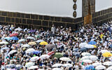 Muslim pilgrims gather to perform the farewell circumambulation or "tawaf," at the Grand Mosque in the holy city of Mecca on June 18, 2024, at the end of the annual hajj pilgrimage. (AFP)