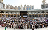 Muslim pilgrims perform the farewell circumambulation or "tawaf," circling seven times around the Kaaba, Islam's holiest shrine, at the Grand Mosque in the holy city of Mecca on June 18, 2024 at the end of the annual hajj pilgrimage. (AFP)