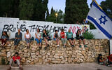 Protesters gather during an anti-government rally calling for early elections and a hostage deal, outside the Knesset in Jerusalem on June 18, 2024 (Menahem Kahana / AFP)